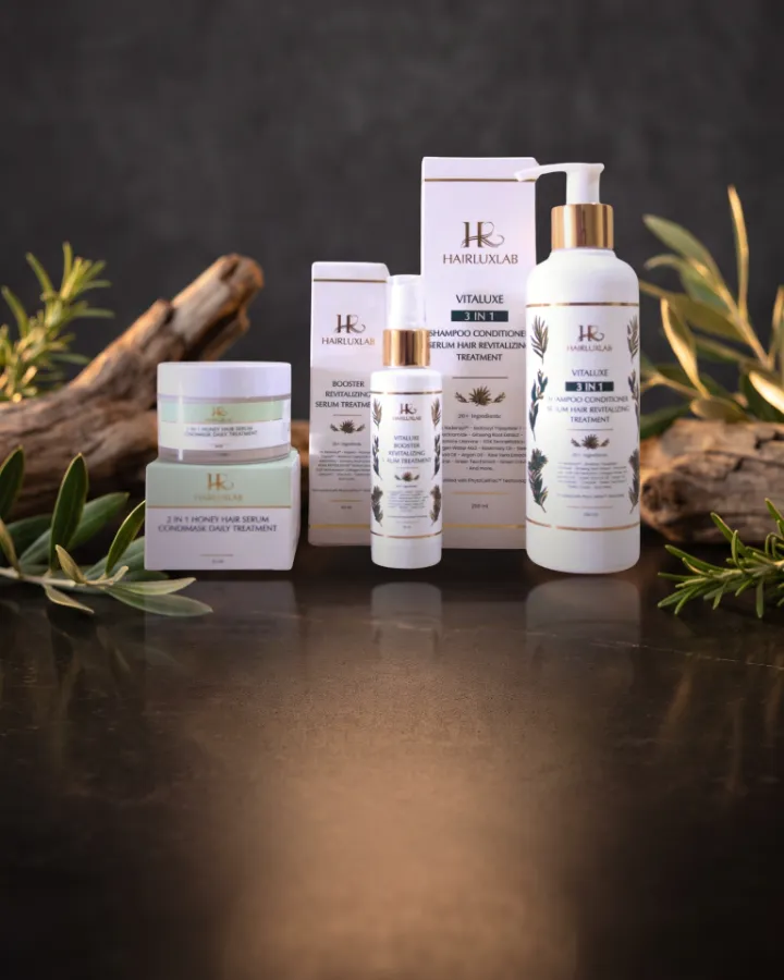 Honey Hair Serum Condimask, Booster Revitalizing Serum, dan Vitaluxe 3 in 1 beserta dusnya di atas meja batu gelap